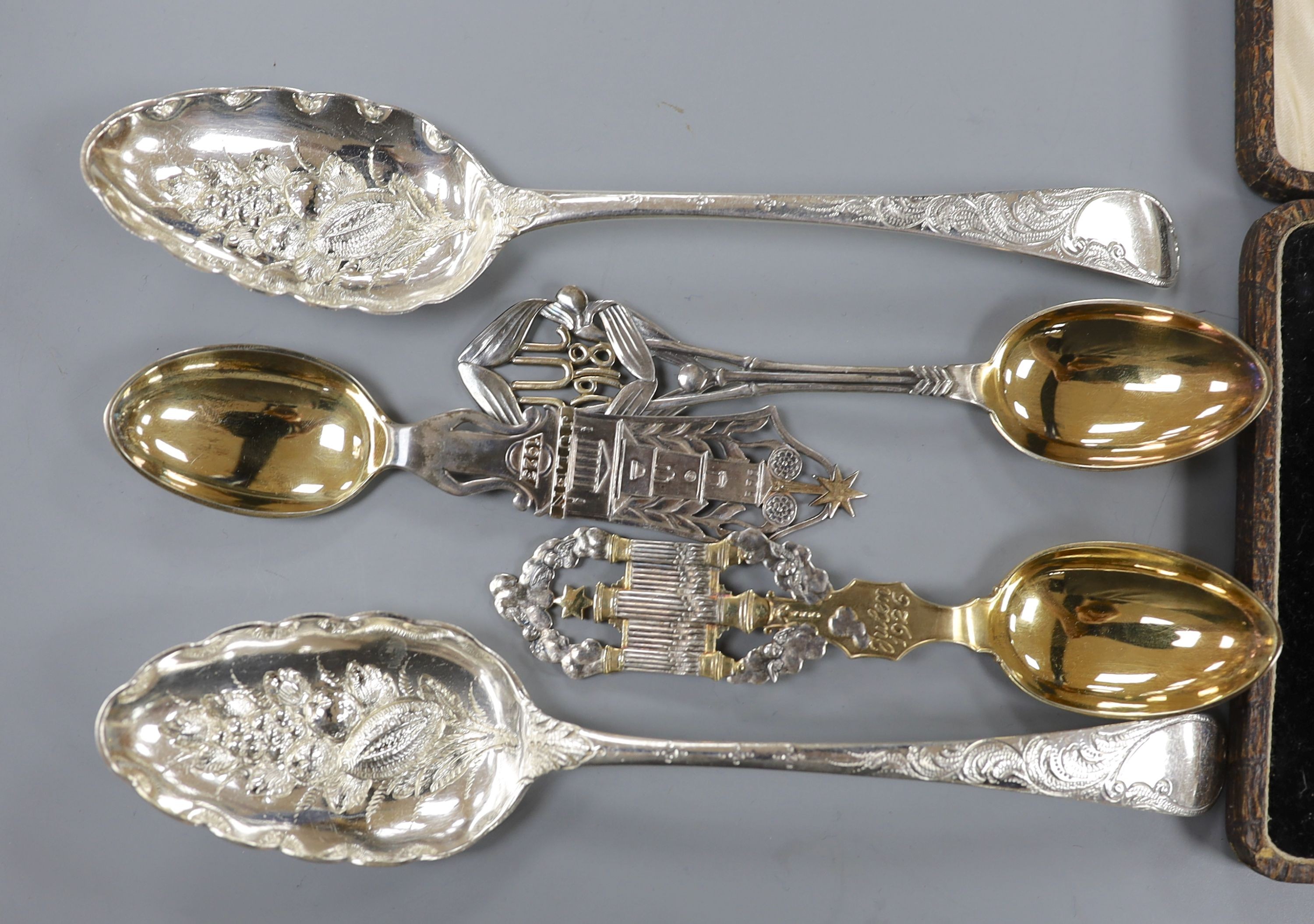 A pair of Victorian silver Old English pattern 'berry' spoons, London, 1837, three later Danish parcel gilt white metal commemorative spoons and a cased set of silver bean end coffee spoons